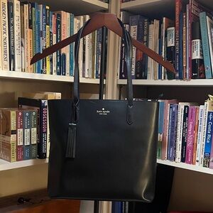 kate spade black leather tote with tassel